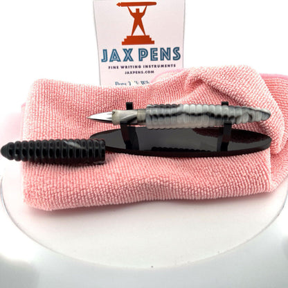 ACME Studios' “Rings Black/White" Rollerball Pen By Haussmanns